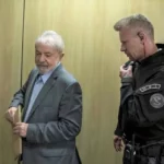 O agente da Polícia Federal Jorge Chastalo e Lula — Foto: reprodução