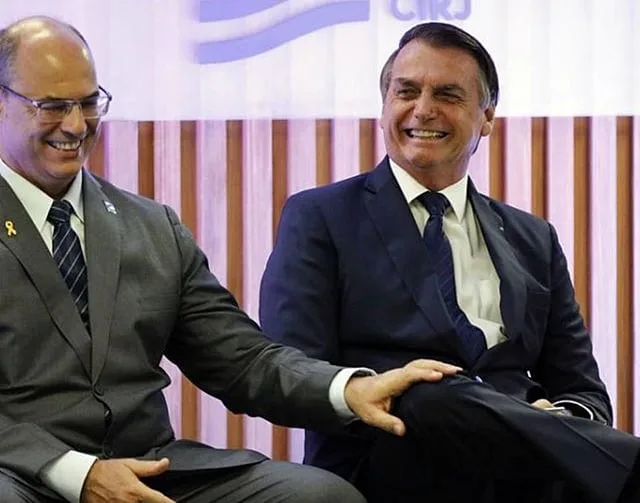 O ex-governador do Rio de Janeiro Wilson Witzel e o ex-presidente Jair Bolsonaro. Foto: Fernando Brazão/Agência Brasil