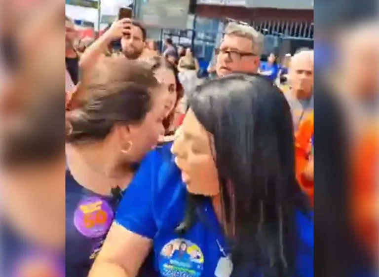 As candidatas trocam empurrões enquanto popular grava a confusão. Foto: Reprodução / Redes Sociais