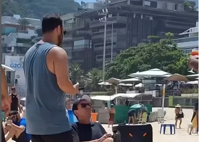 uardo Paes em ação nas praias do Rio, usando heavy metal para reforçar as regras.